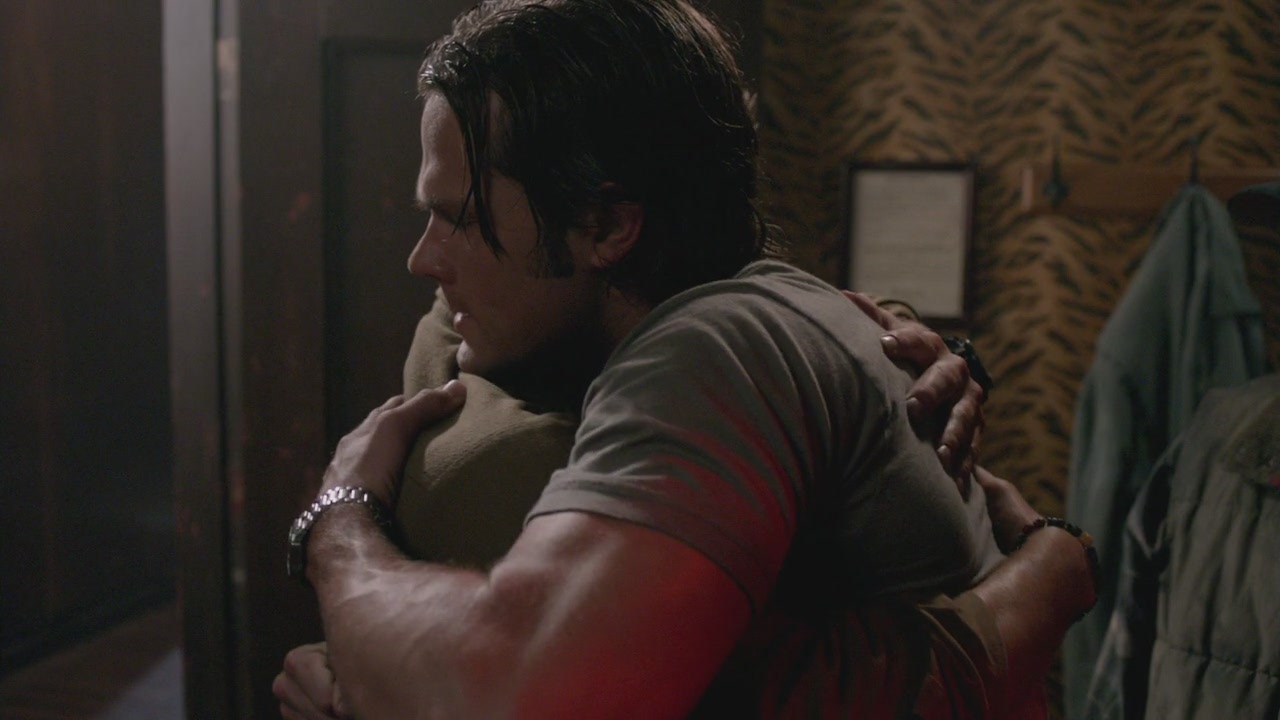 Sam desperately hugging Dean