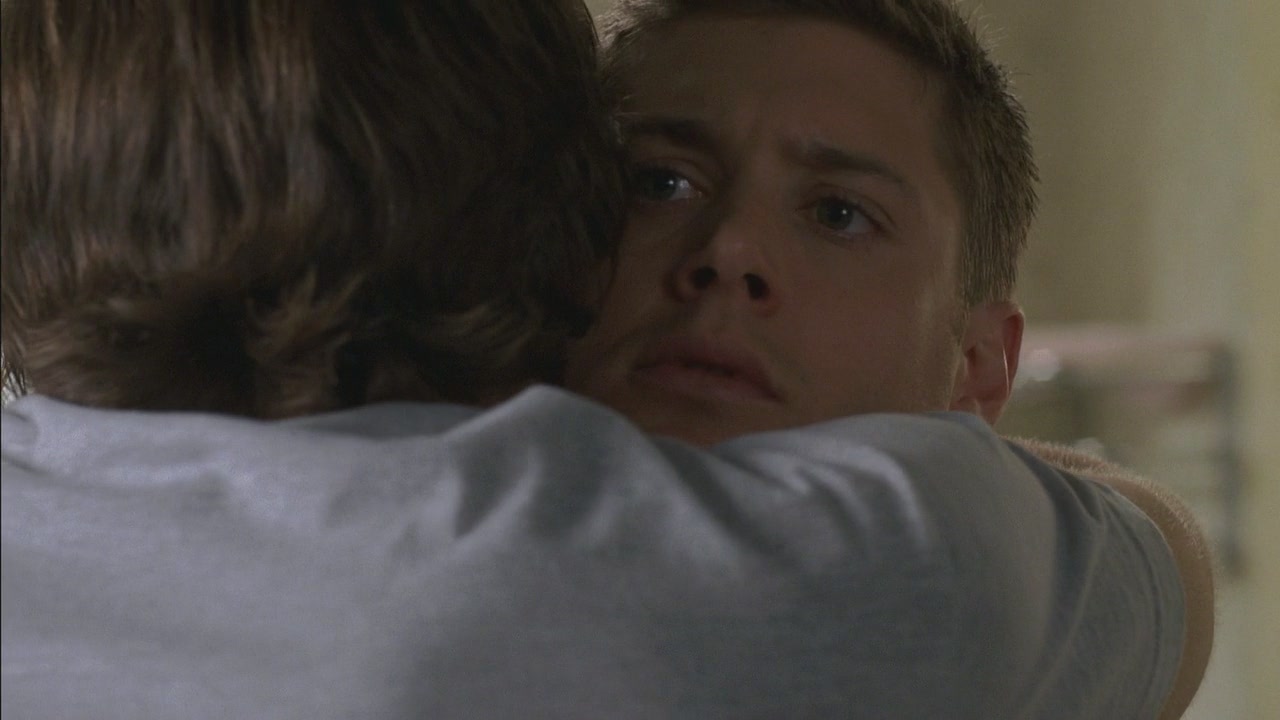 Dean being hugged by Sam