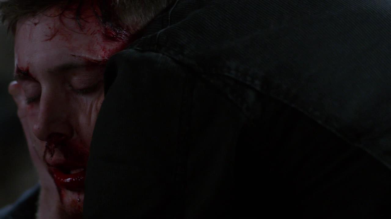 Dean's corpse being hugged by Sam
